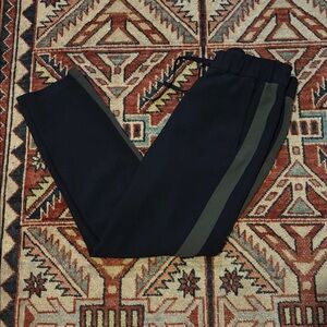 Lululemon On the Fly Woven track pants black with a dark olive stripe size 4